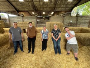 Guests visit a local farm on their Nutley Edge supported holiday
